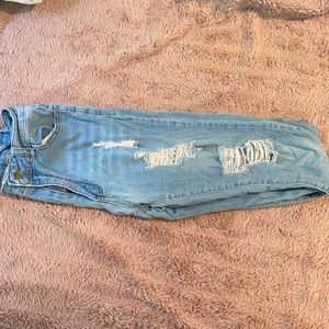Distressed light denim washed skinny jeans